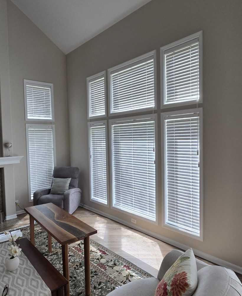 Window wall with vaulted ceiling and horizontal blinds